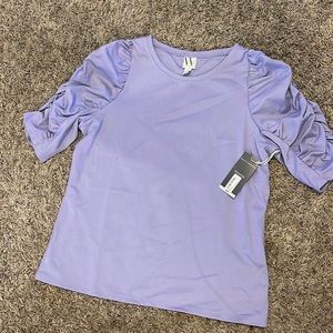 Lilac colored shirt, new with tags.